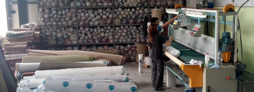 The carpets are packed in a special ultra-modern packaging machine